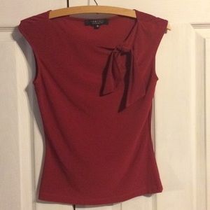 Red sleeveless shirt with ribbon